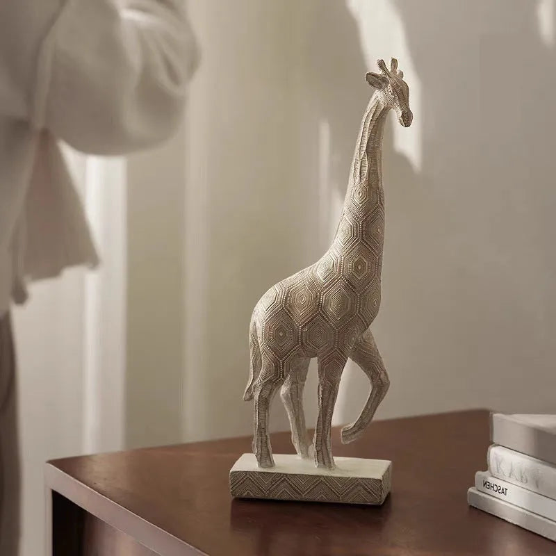 Wood colour synthetic resin giraffe decorative figure ornament on a shelf.