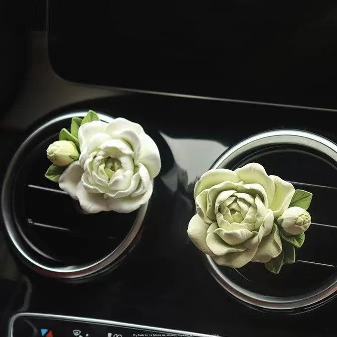Jasmine scent solid gypsum car air vent clip diffuser measuring 5 by 4.5 centimetres.
