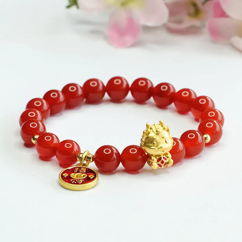 Close-up of a red agate bead dragon zodiac bracelet with 8mm beads in a Chinese style.