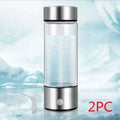 Portable hydrogen water cup with high borosilicate glass body and 304 stainless steel components, showing electrolysis bubbles.