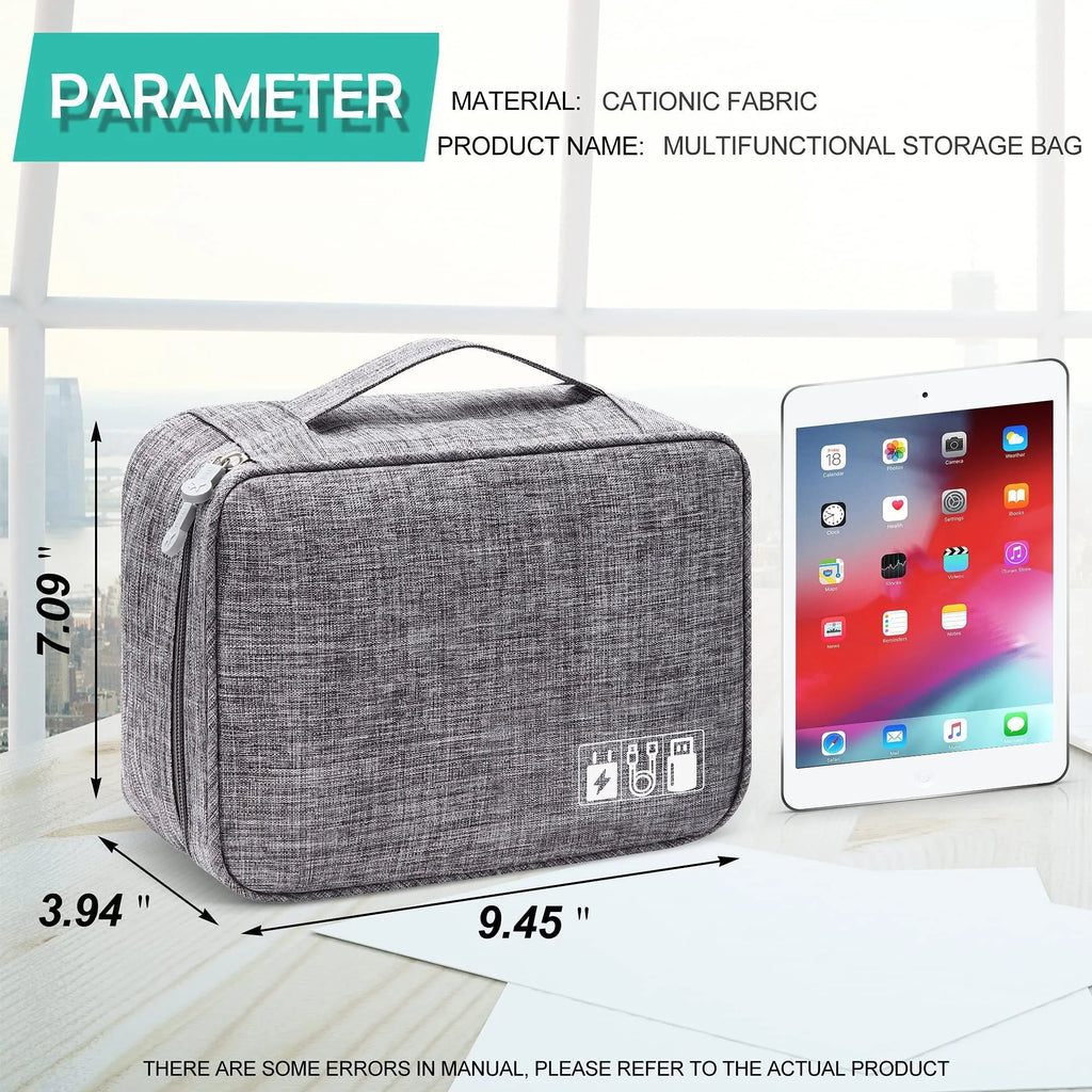 Black waterproof electronics travel organizer case open, showing mesh pockets, elastic loops and removable padded dividers.