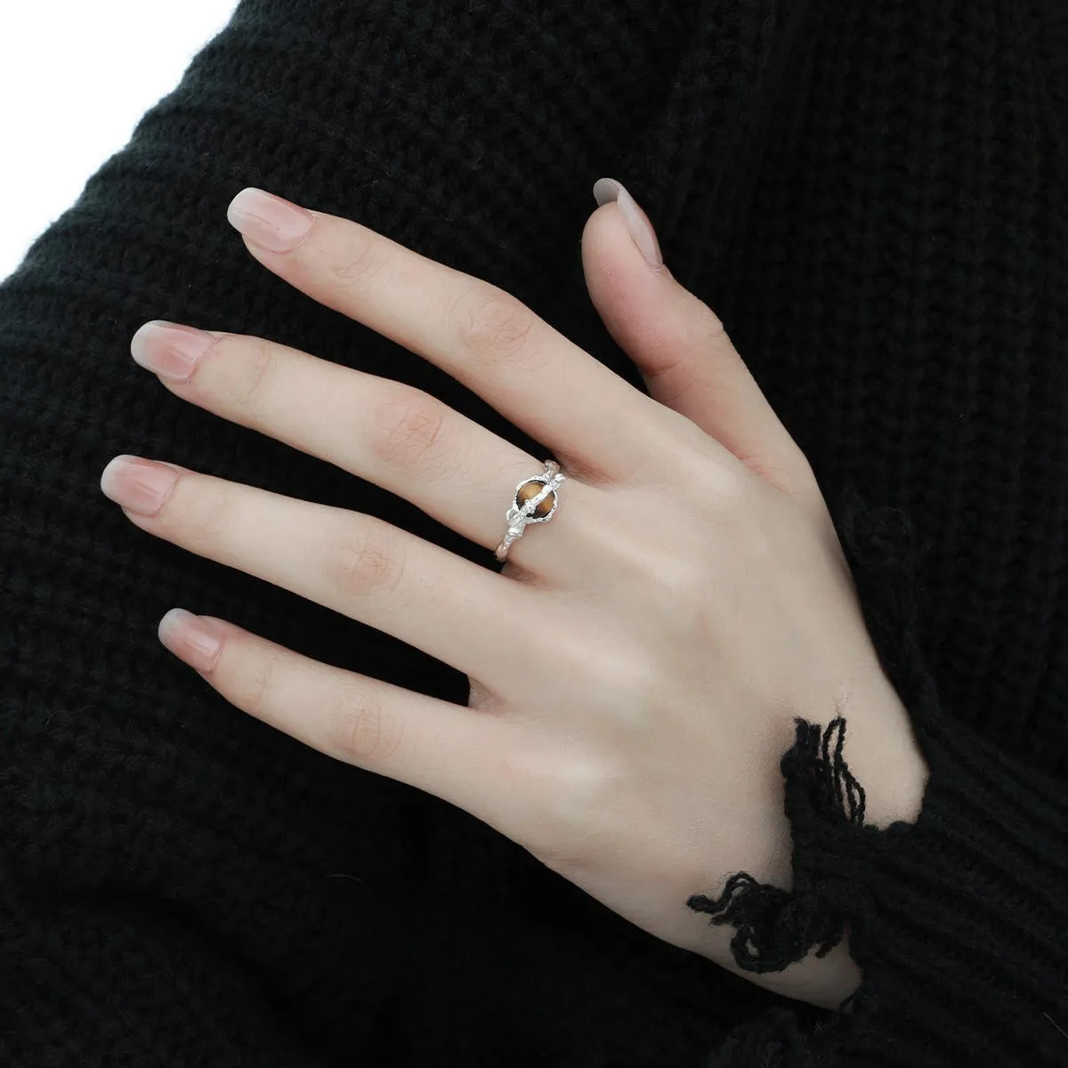Women's adjustable silver open ring with Saturn design and white gold colour finish.
