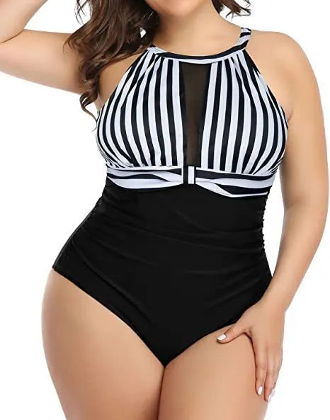 Women's black one-piece swimsuit with lace trim on a mannequin.