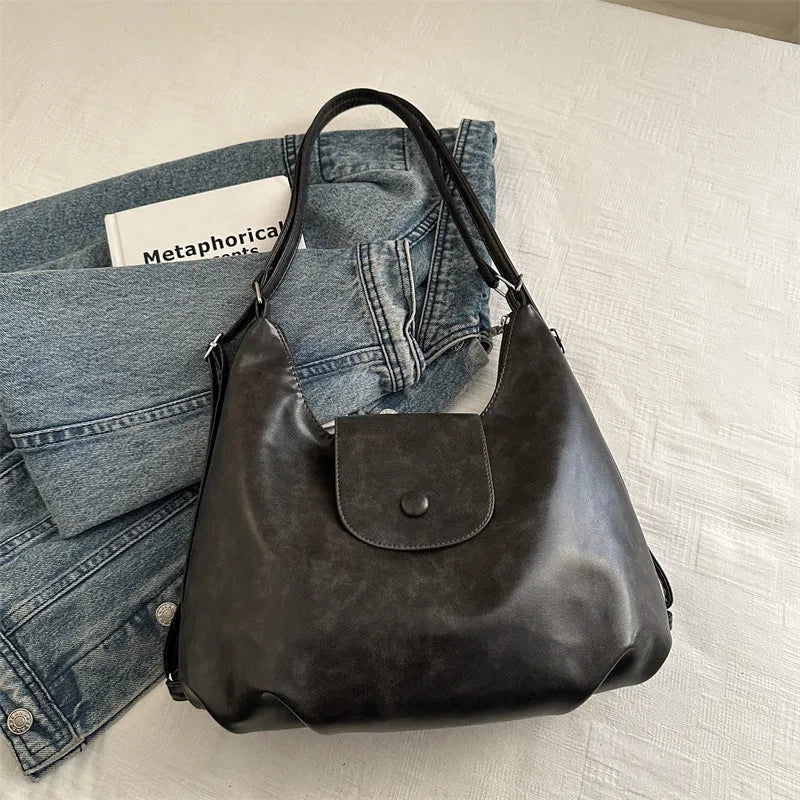 Women's black PU leather horizontal square shoulder bag with single strap and mobile phone compartment