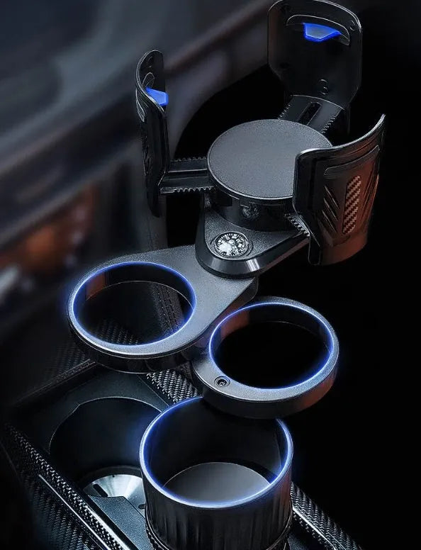 Black car cup holder with retractable base and carbon fibre pattern, shown holding a water bottle.