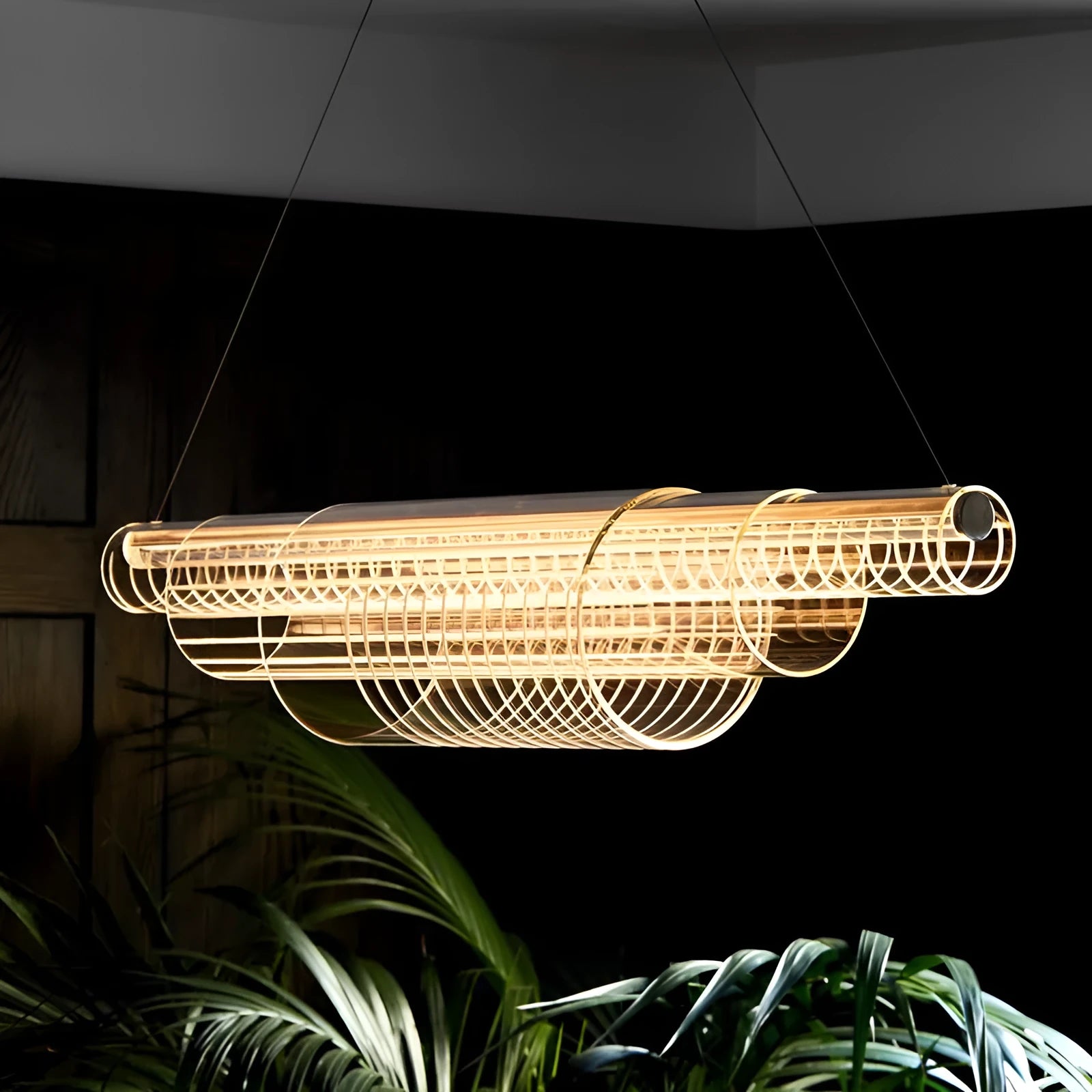 Modern minimalist glass pendant lamp with iron fittings and LED light in three length options.