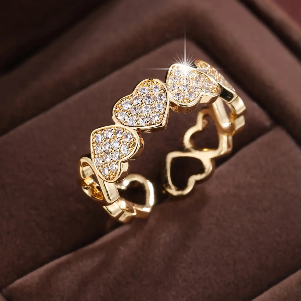 Adjustable opening gold colour couples ring with love heart design and diamond texture