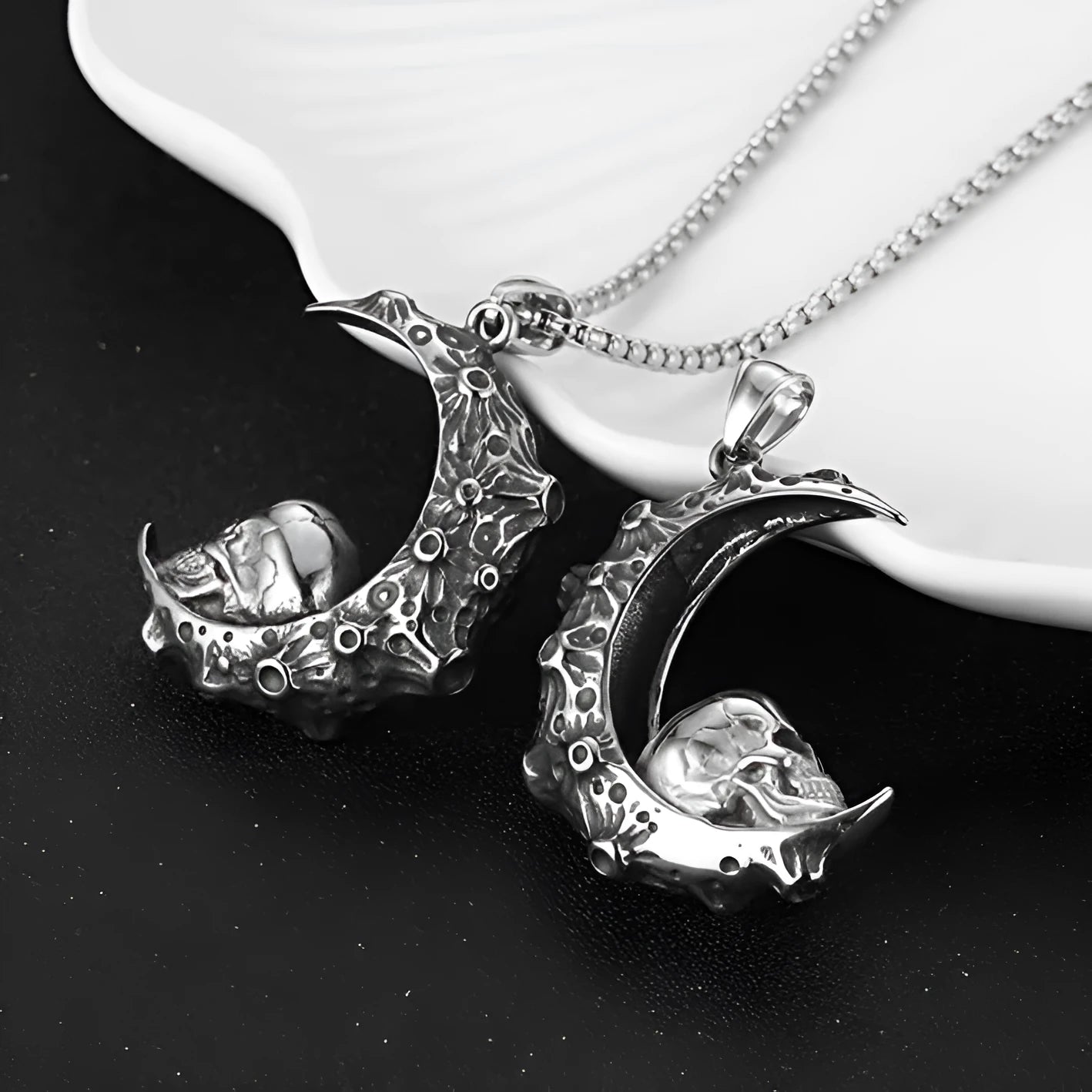 Men's silver skull necklace with stainless steel chain and alloy pendant in six design variations.