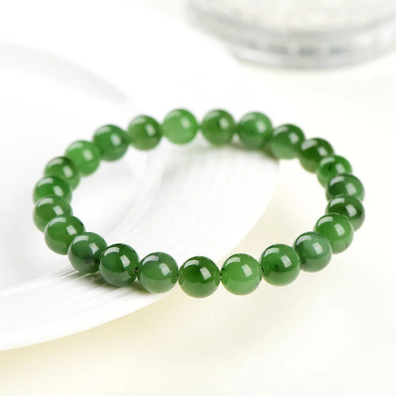 Natural jasper ball bracelet showing polished Hetian jade and jasper stone beads in one of five available sizes from 4mm to 12.8mm.