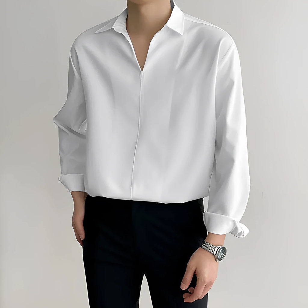 Loose lapels casual shirt in polyester fabric available in four colours with non-ironing feature