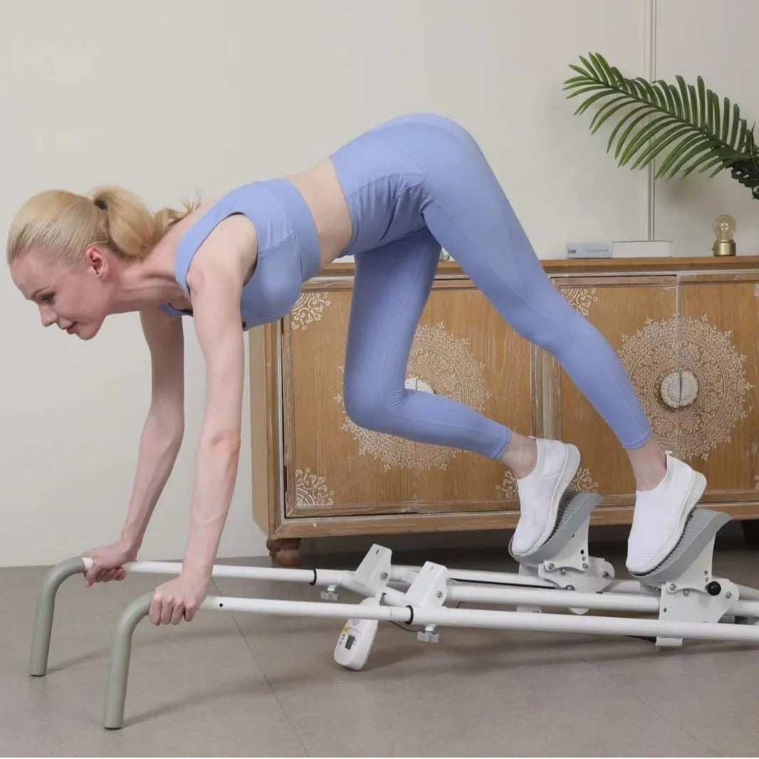 White foldable treadmill integrated with a climbing frame for home fitness exercise.