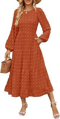 Women's beige high-waist long sleeve dress with ruffled sleeves on a hanger.
