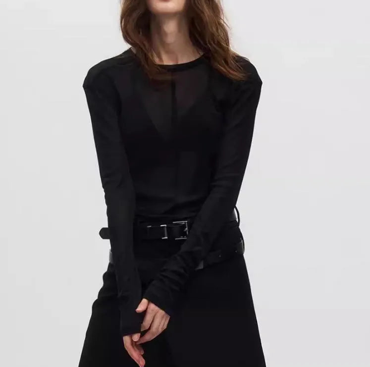 Black mesh slim-fit long sleeve PU pullover top with round neck on a model