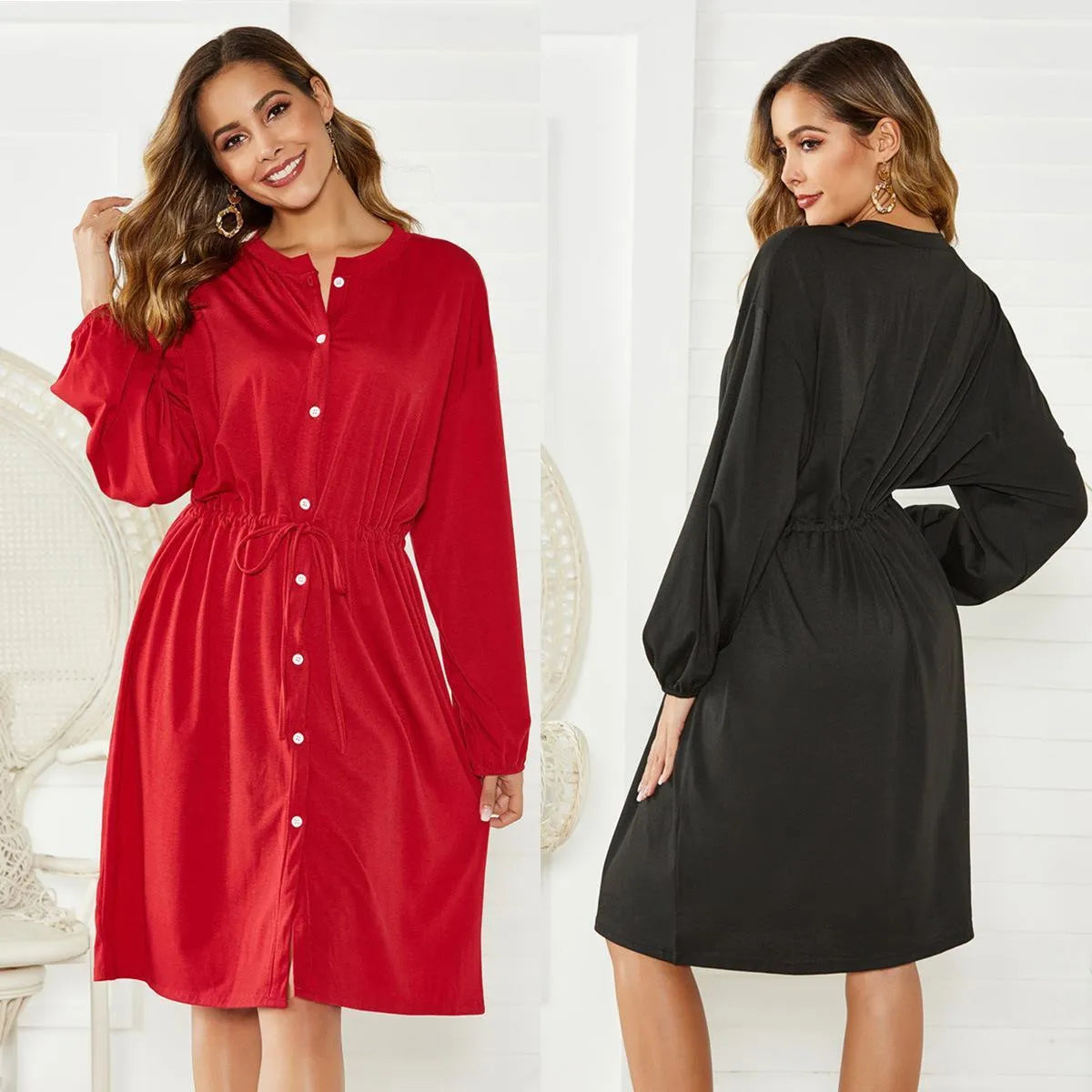 Black A-line midi dress with elastic waistband and cinched belt, long sleeves with elastic cuffs