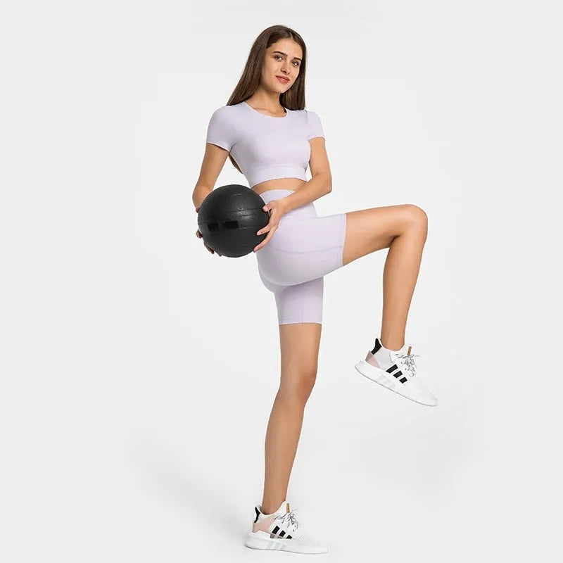 Women's tight sports shorts in black cotton blend fabric for running and fitness activities
