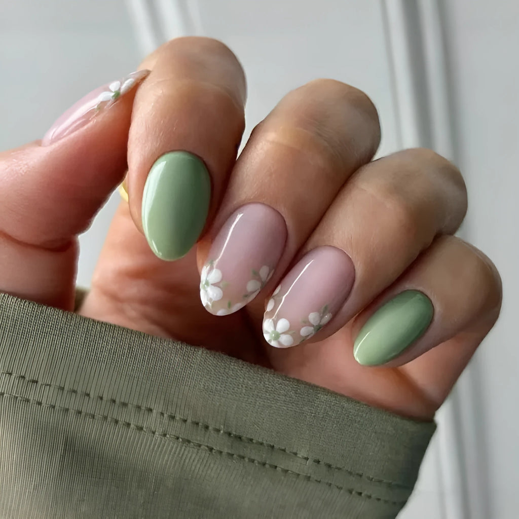 Long almond artificial nails with white little flower pattern and jelly glue rub in CW680 colour classification