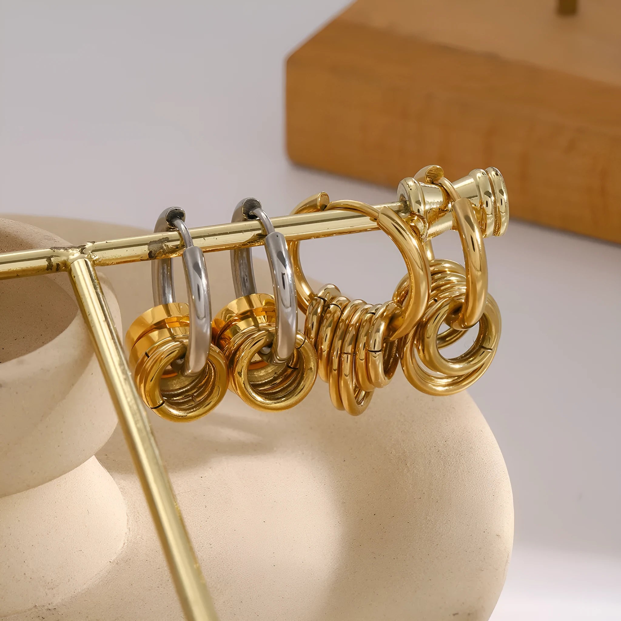 A pair of ins style stainless steel earrings with an electroplated colour finish.