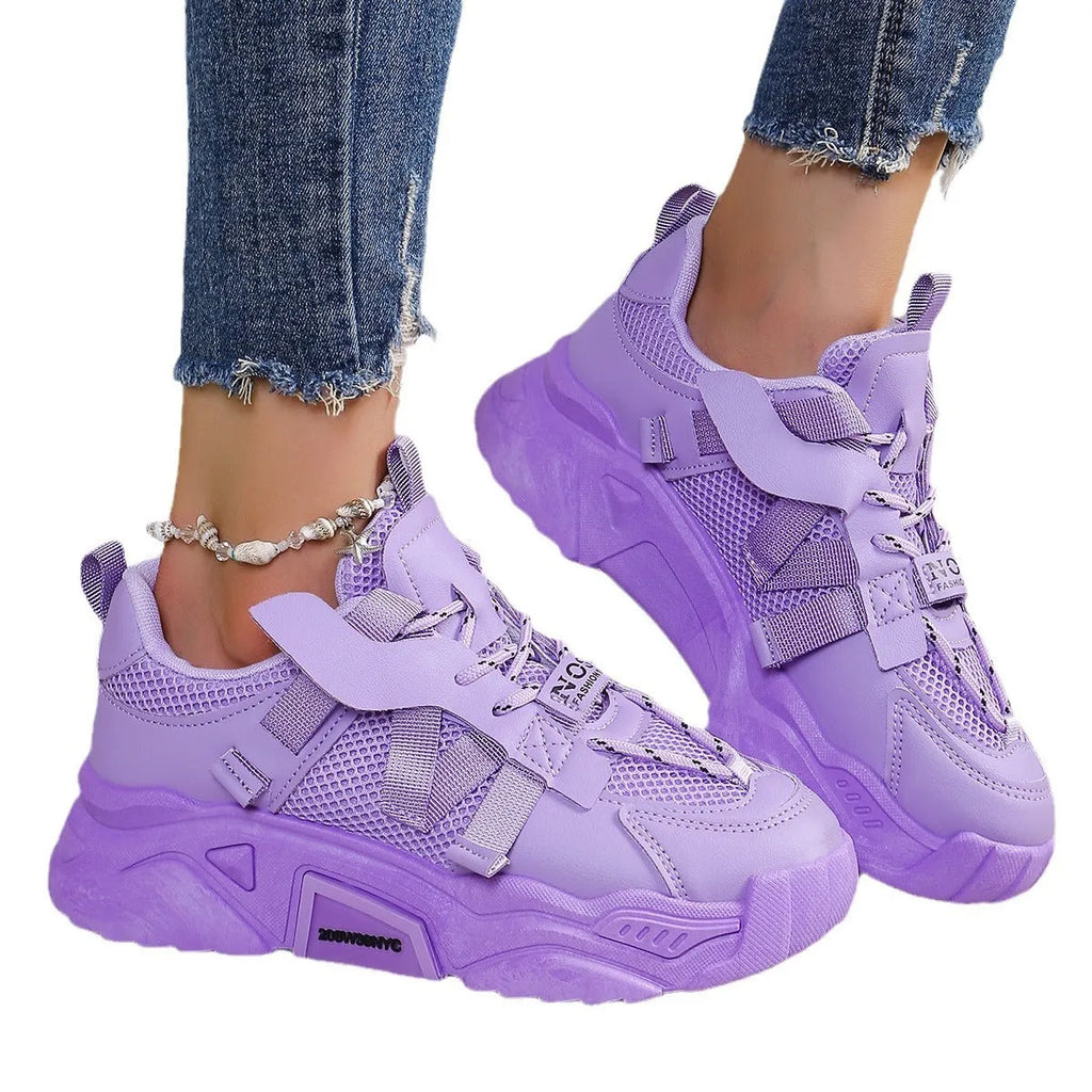 Women's platform mesh sports shoes in animal pattern design showing height increase sole and front lace-up closure