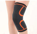 Pair of black stretch polyester sports knee pads with a textured non-slip interior.