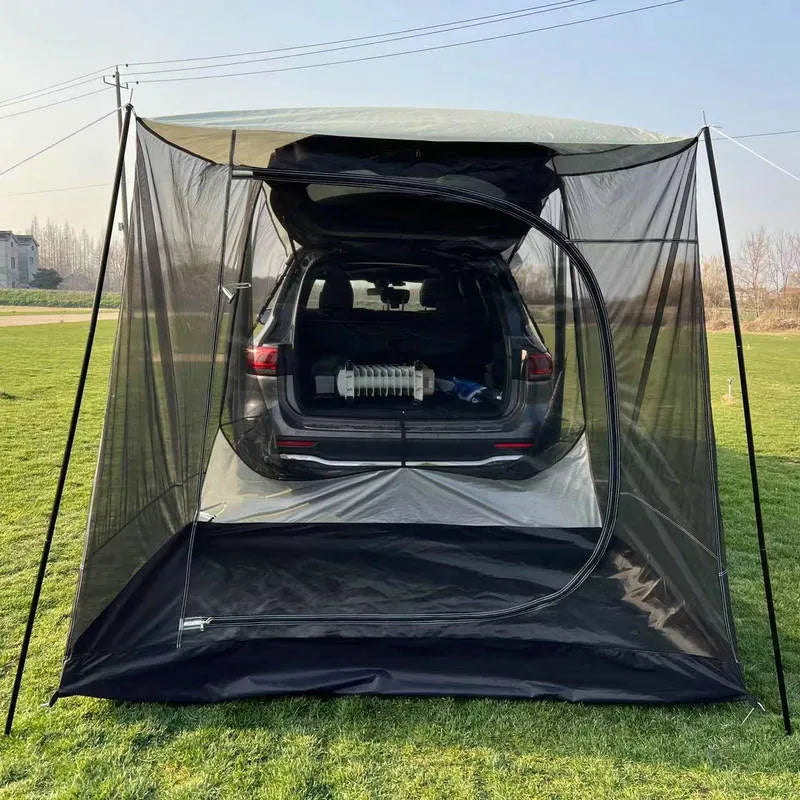 Car tail extension tent set up at a campsite with rear access, showing 190T silver-coated anti-UV fabric and screen windows.