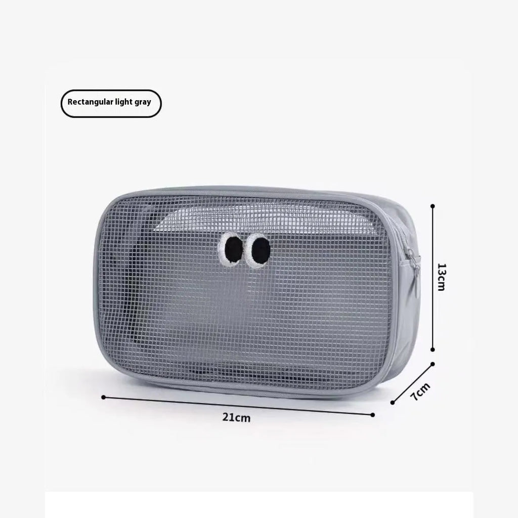 Stereo large capacity mesh makeup wash bag in cube shape, polyester, with zip closure, on a table