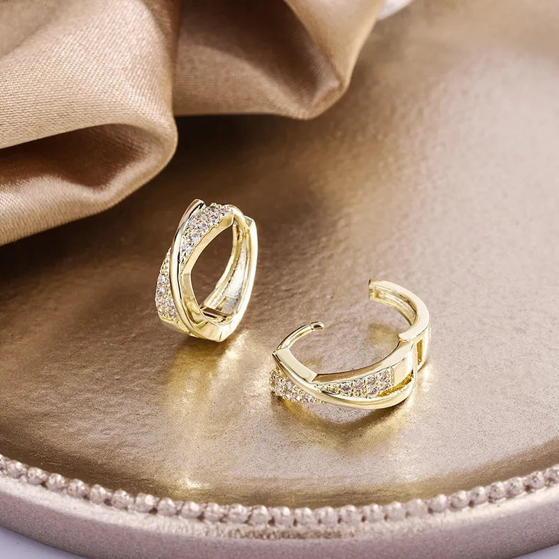 Geometric copper stud earrings with zircon detailing in 14K yellow gold colour