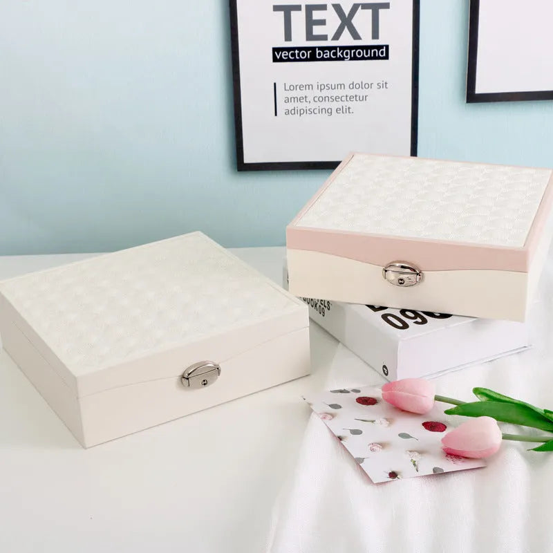 Red or white PU leather jewellery storage box for necklaces and rings with minimalist design