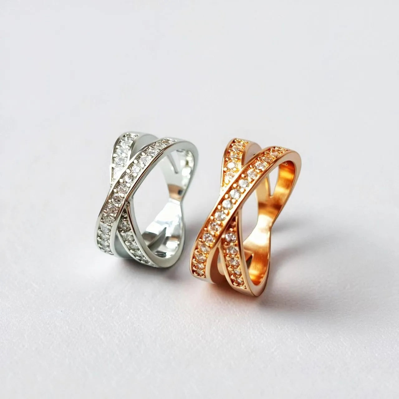 Silver and rose gold micro-inlaid zircon cross ring on copper alloy base with geometric heart design
