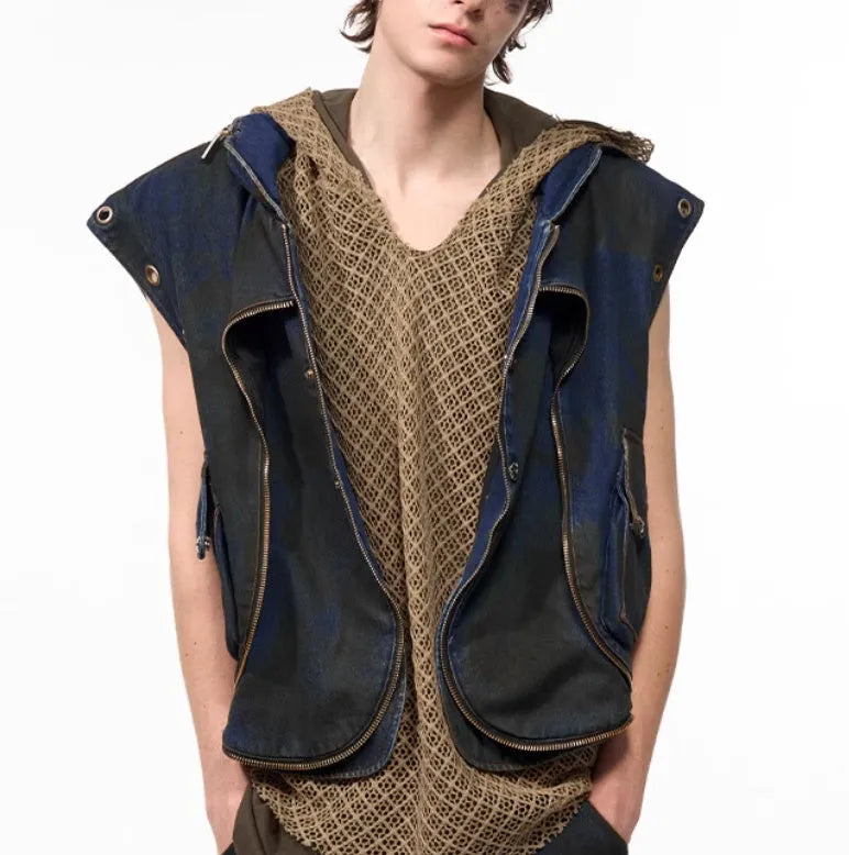 Blue heavy industry style hooded denim vest coat with matching trousers laid flat.