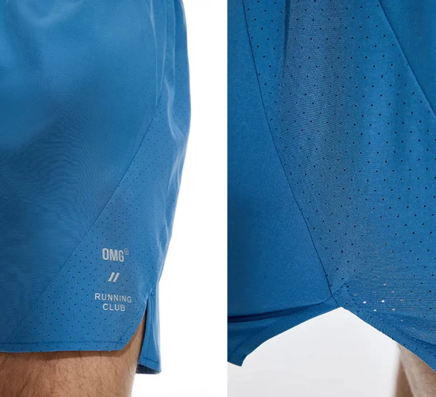 Black running shorts with laser-punched stitching and four-sided stretch fabric laid flat.