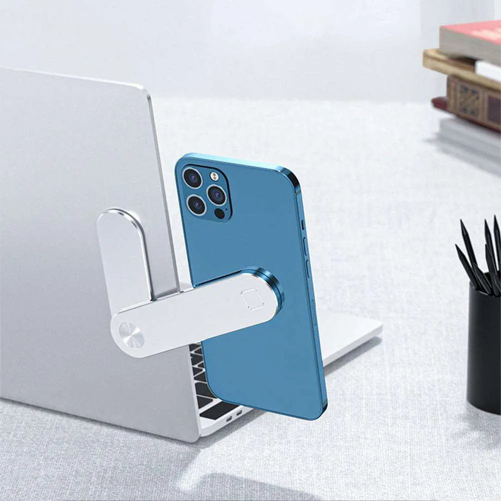 Black aluminium laptop phone holder with magnetic mount attached to computer monitor