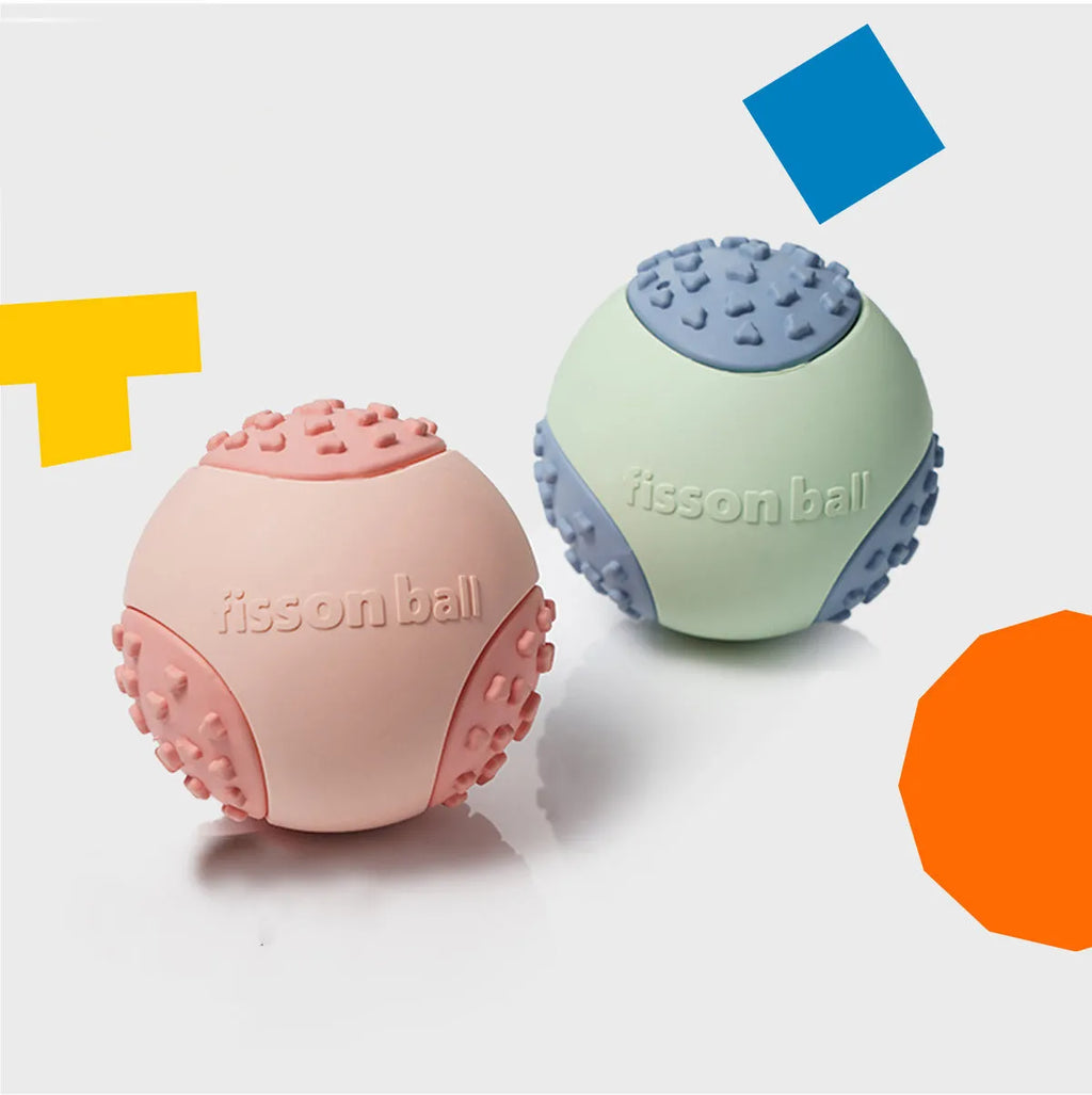 Green and pink 64mm durable rolling ball interactive dog toy.