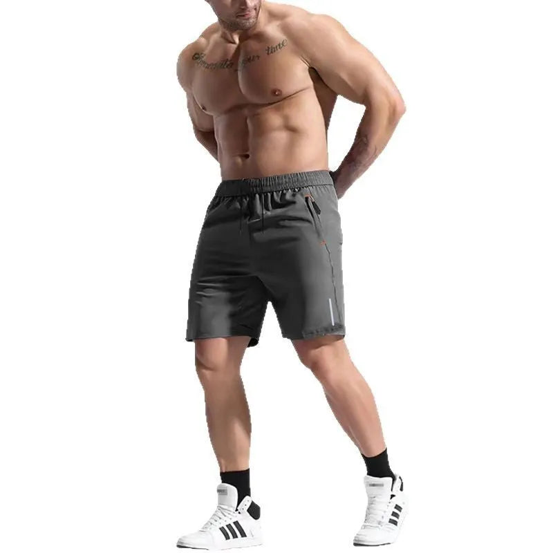 Men's grey elastic waist bamboo fibre sports shorts laid flat, showing drawstring and shorts length.