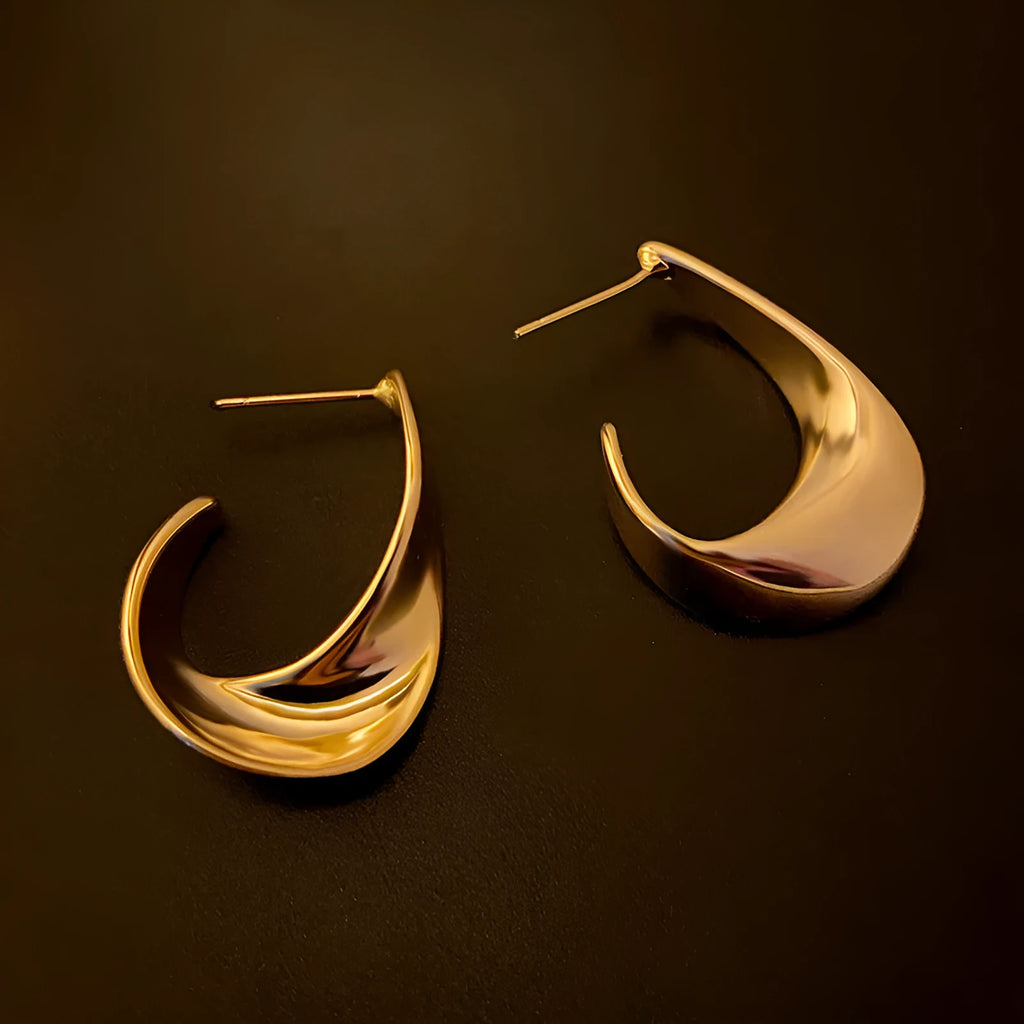 Twisted geometric metal earrings in gold and silver electroplated finishes