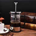 350ml manual coffee maker with glass and stainless steel construction, compact 10x8x17cm dimensions