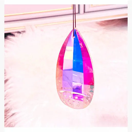 Rainbow coloured electroplated crystal decorative ornament in a tree shape for garden or indoor display.