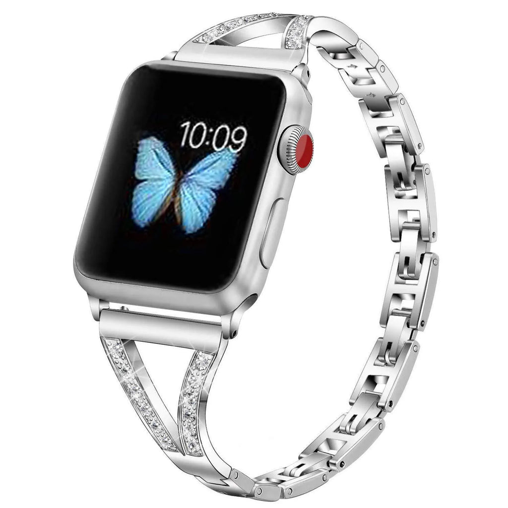Silver herringbone diamond pattern metal band for Apple Watch on a wrist, showing adjustable links.