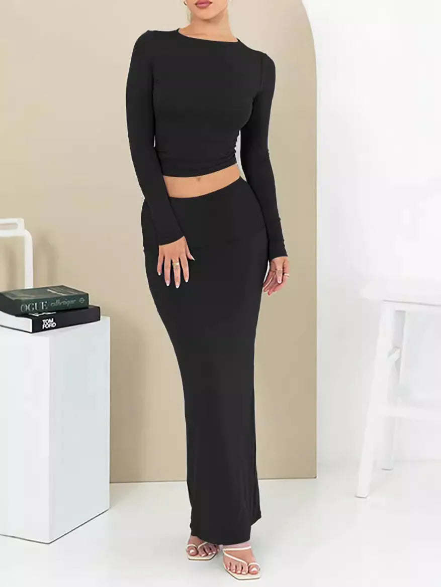 Women's polyester two-piece suit with three-quarter sleeve top and long skirt in sweet style