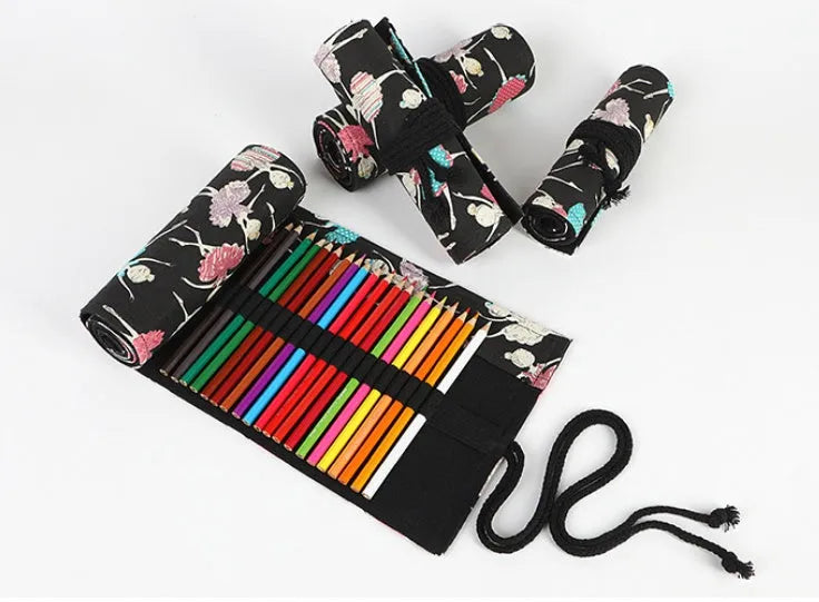Square canvas rolling pencil case with ballet girl print, showing multiple pencil holes inside.