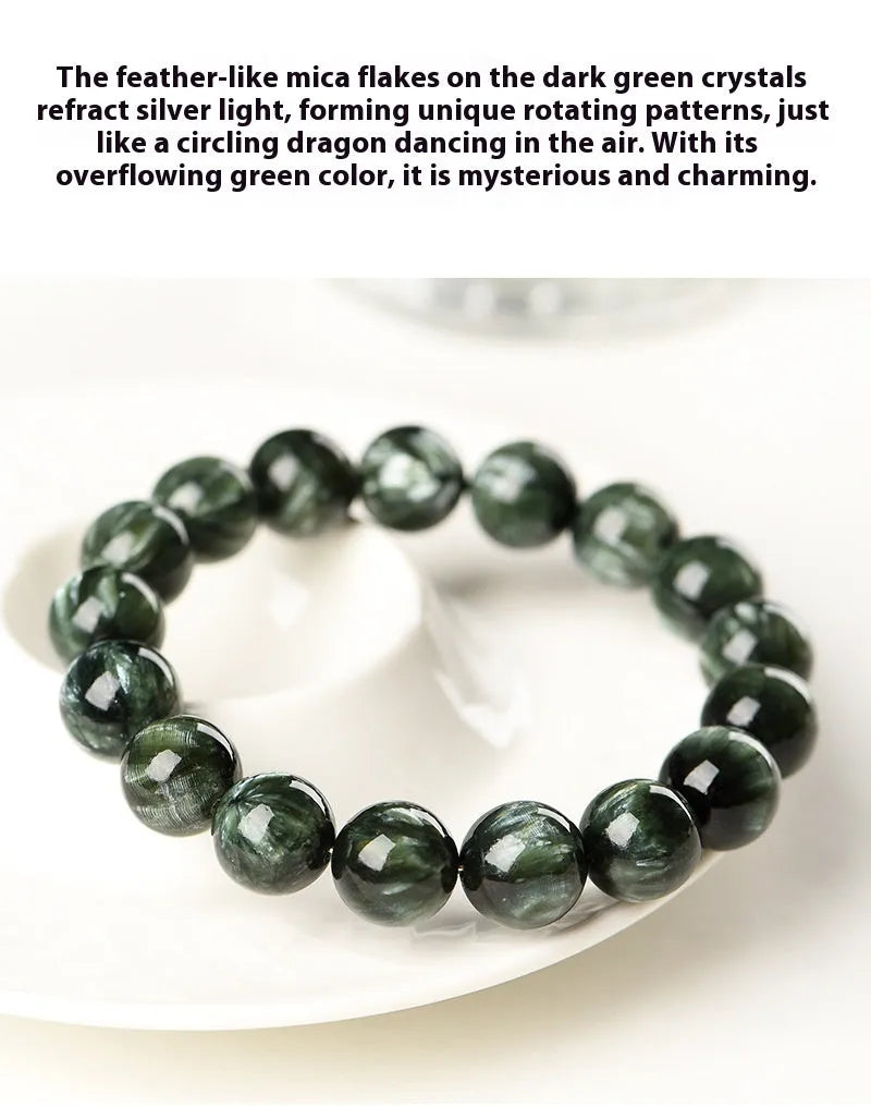 Green Dragon Crystal bracelet with 8-9mm round beads and Ruyi design elements on wrist