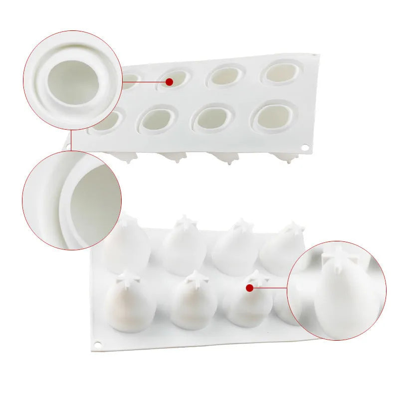 Set of six flexible silicone baking moulds shaped like pears, pineapples, and pine cones.