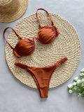 Women's khaki underwire bikini swimsuit with split bottom briefs on a mannequin.