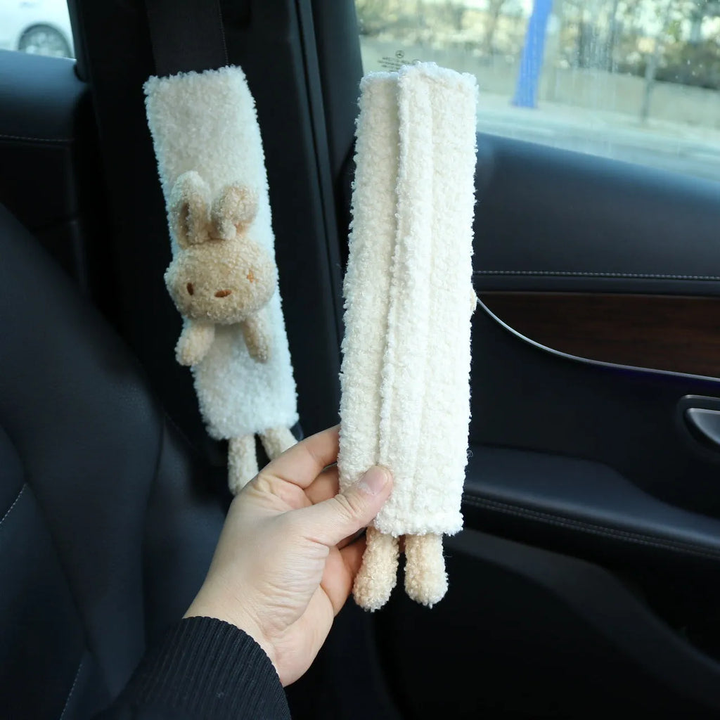 Cartoon plush car seatbelt shoulder protector in lamb wool, showing bear and rabbit design options.