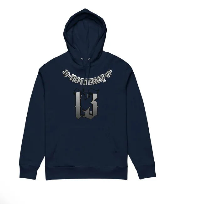 A loose-fitting, hooded pullover sweater with a fleece lining, shown in various colours including white, black, and grey.