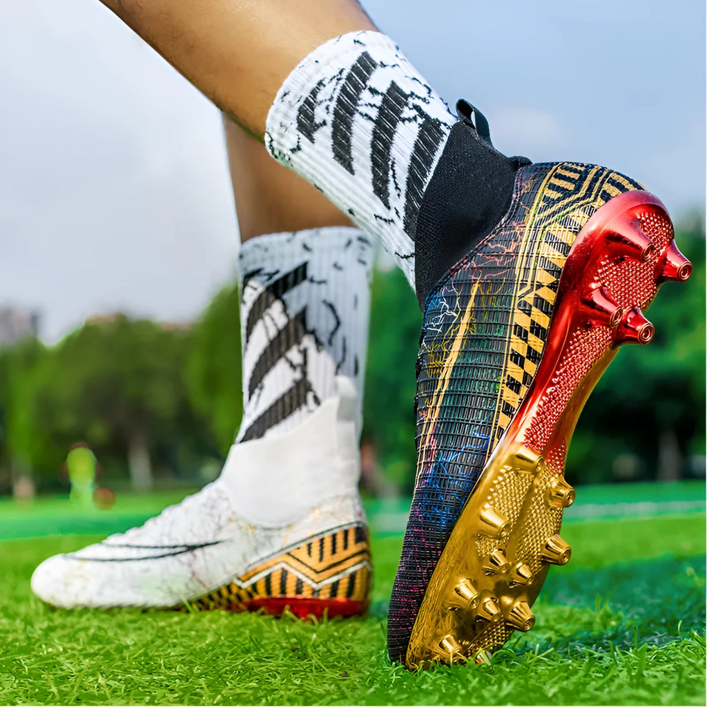Men's high-top football training shoes with gold plated bottom on PVC sole, in white, black, and mandarin duck colours.