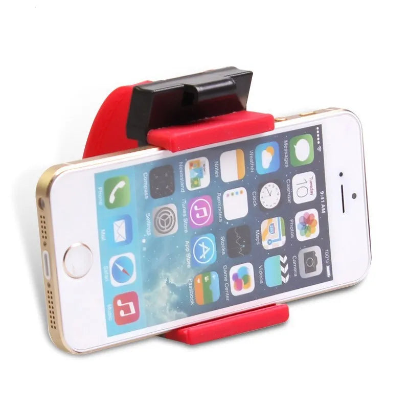 Black steering wheel phone clip holder mounted with smartphone showing navigation display