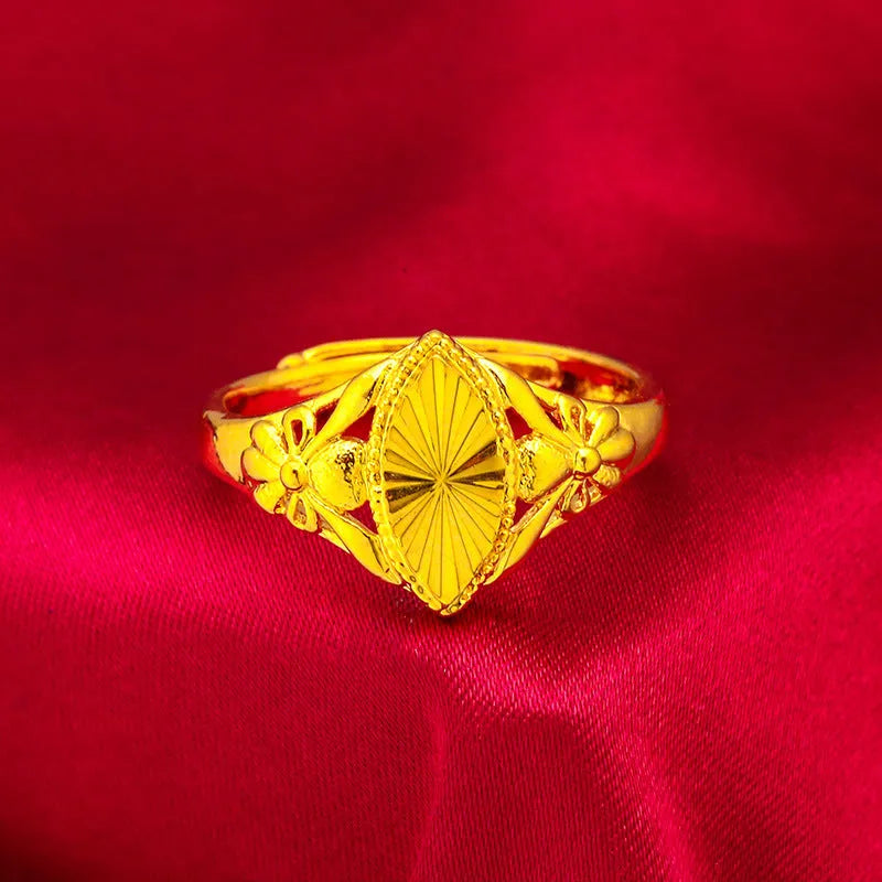 Gold electroplated open diamond flower ring with geometric design and textured surface