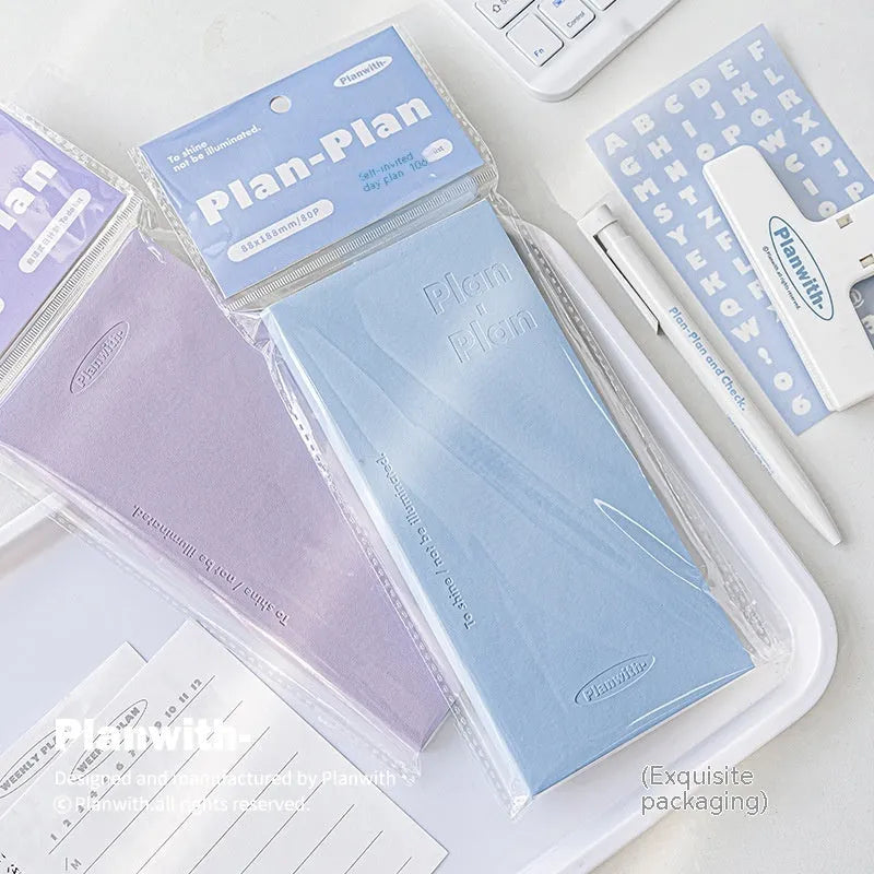 Embossed simple visual daily meter book in blue, showing prefect binding and white paper interior.