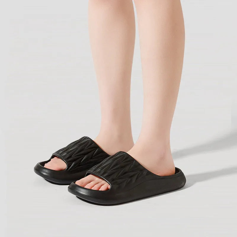 Leaf texture design EVA household slippers in various colours on a non-slip sole.
