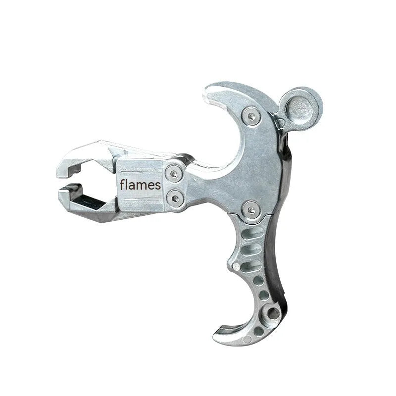 Close-up of a zinc alloy archery release aid showing its two-axis harpoon clip mechanism.